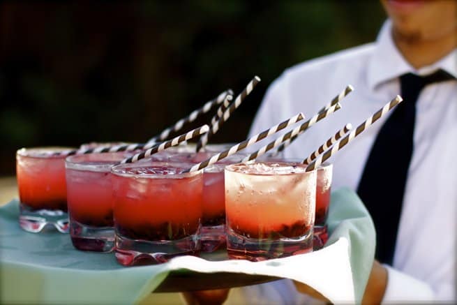 Red cocktails and paper straws | Kelly Chandler Consulting