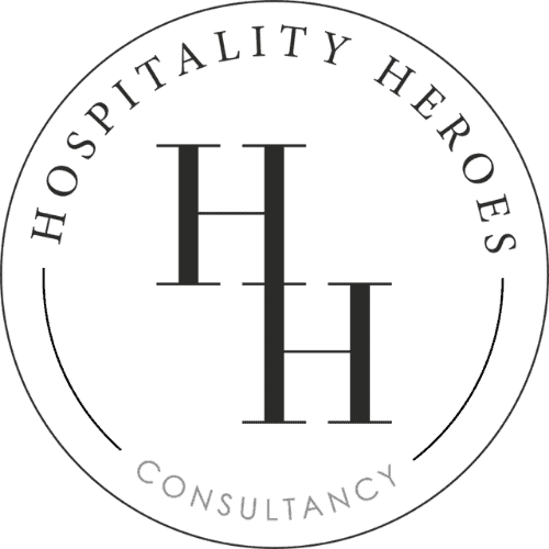 Kelly Chandler logo with Hospitality Heroes Consultancy text in a circular design.