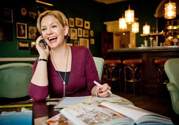 Woman laughing on phone