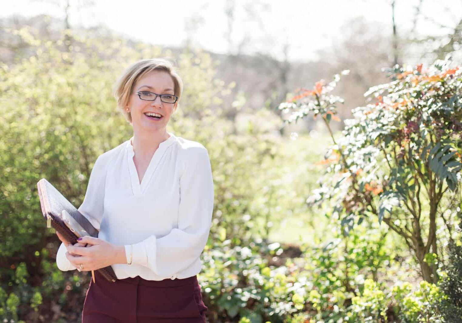 Kelly Chandler standing outdoors